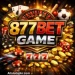 BET877Game promotional image with casino elements like roulette wheel, poker chips, dice, and gold coins on black background